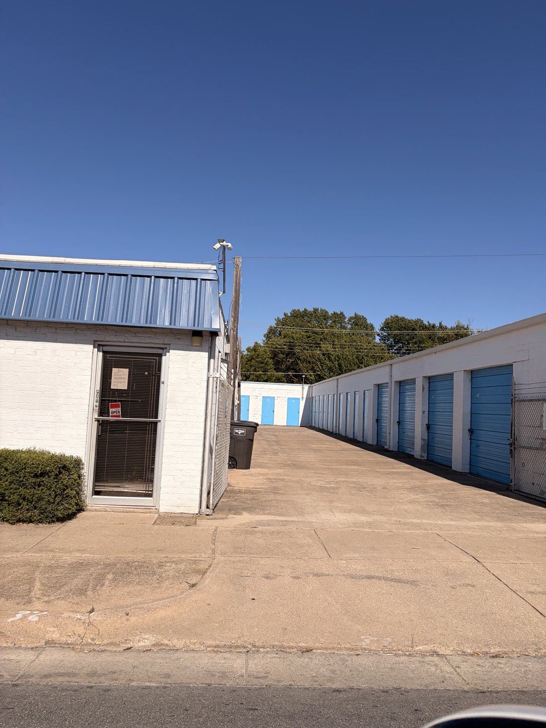 Office building and drive aisle at A-Thrifti Self Storage on 8th Avenue in Fort Worth